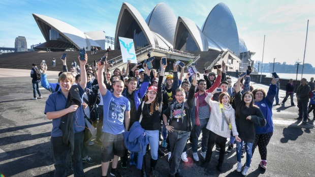 Pokemon Go fans meet at the Opera House on Sunday. Photo: Peter Rae